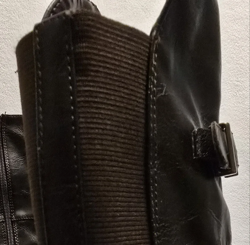 Rocio Black Knee-High Boots. 7